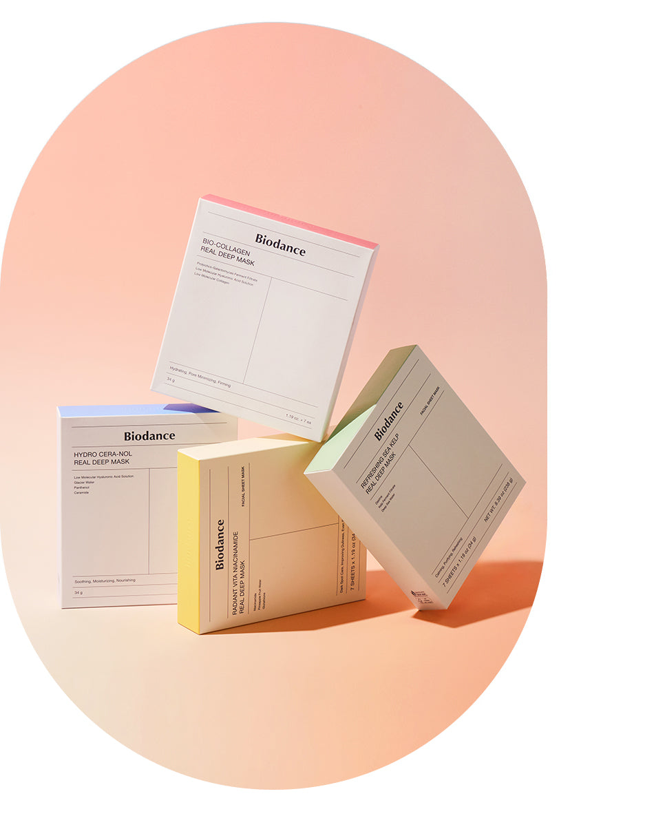 Four Biodance Real Deep Mask boxes on a peach background